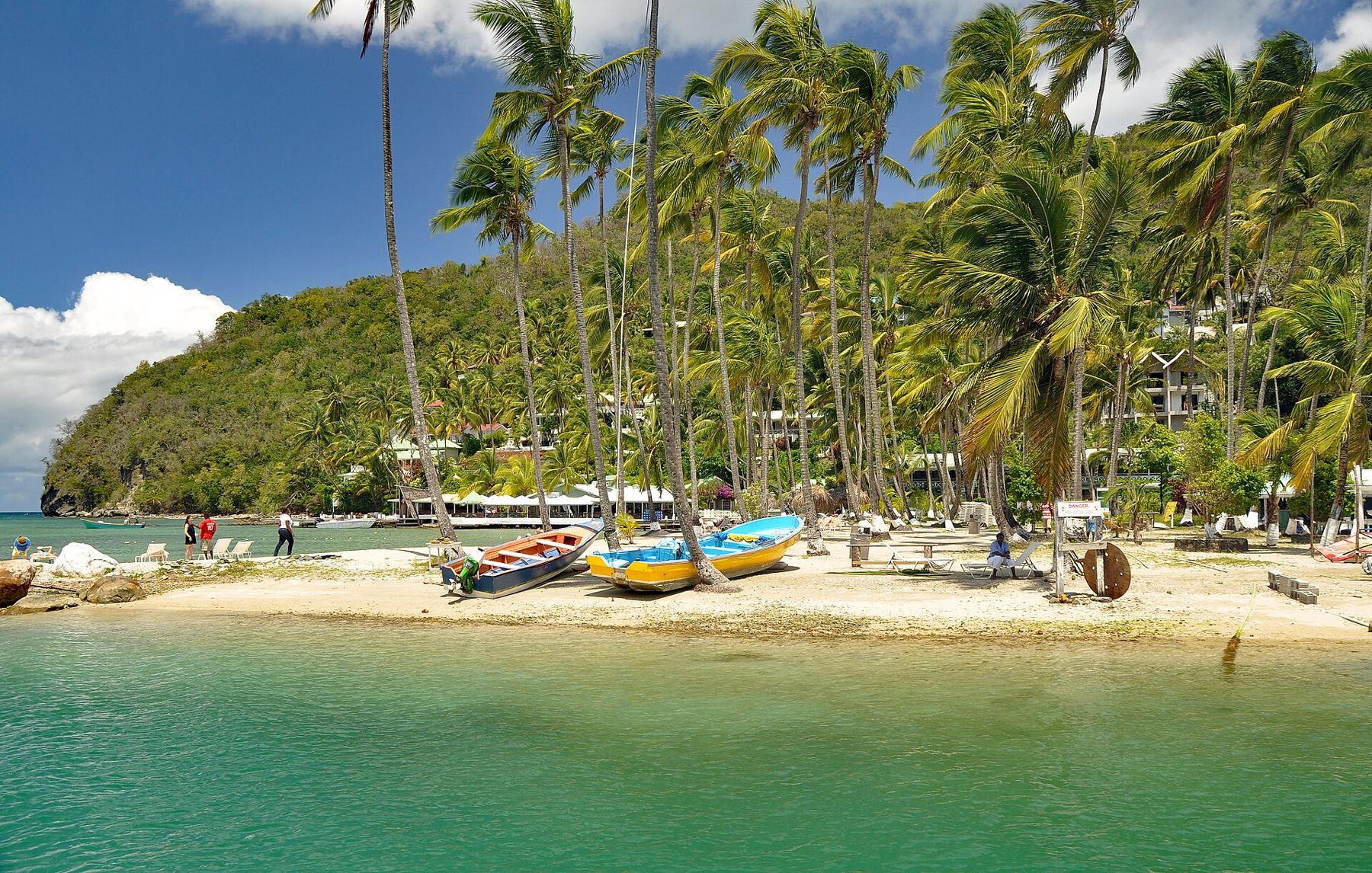 Yachts tucked into palm-lined Marigot Bay